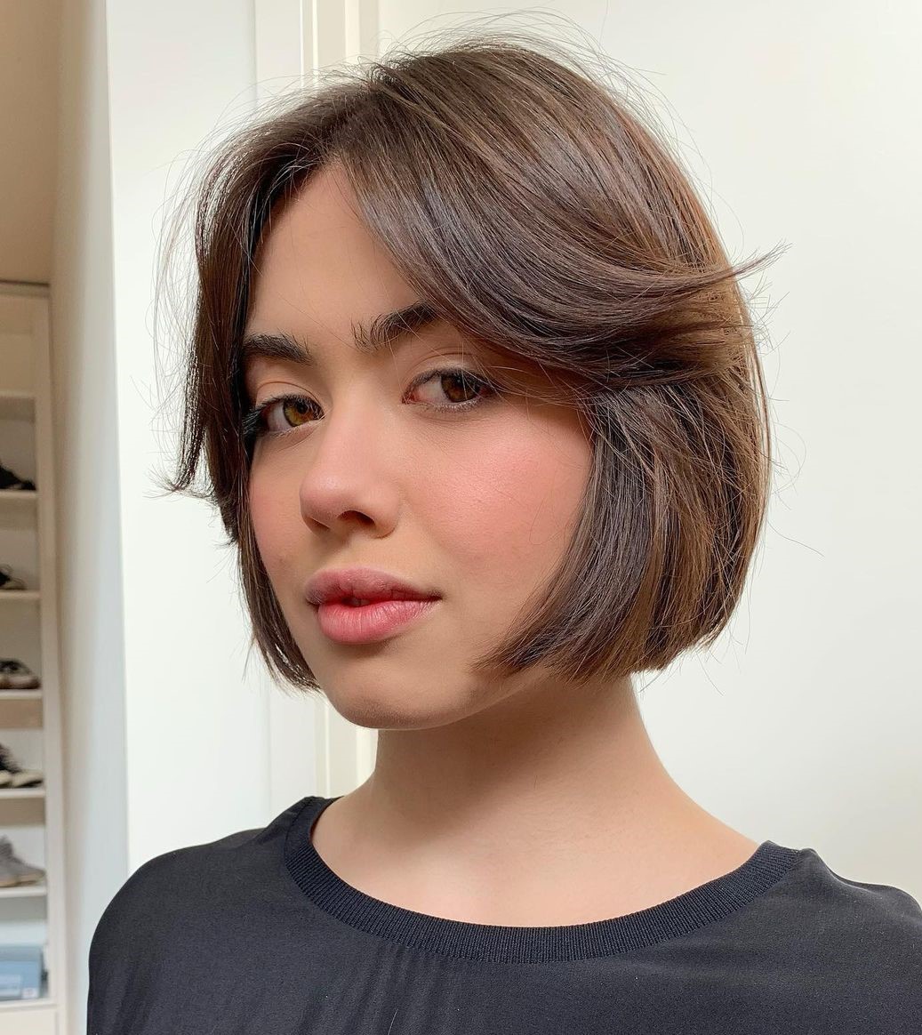 Cute Jaw-Length Bob with Swoopy Bangs