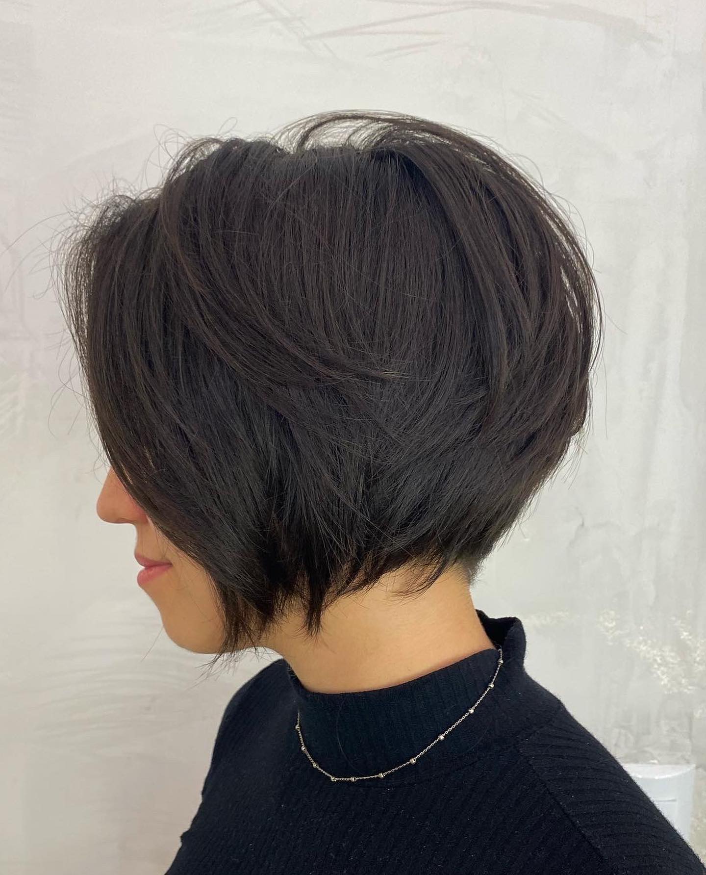 Chin-Length Feathered Bob Cut