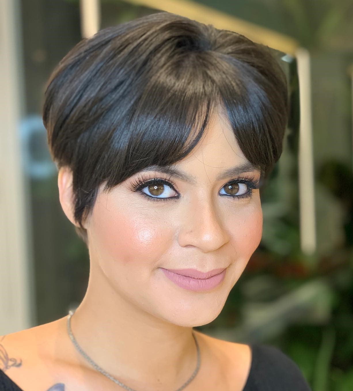 Sleek Polished Pixie with Parted Bangs