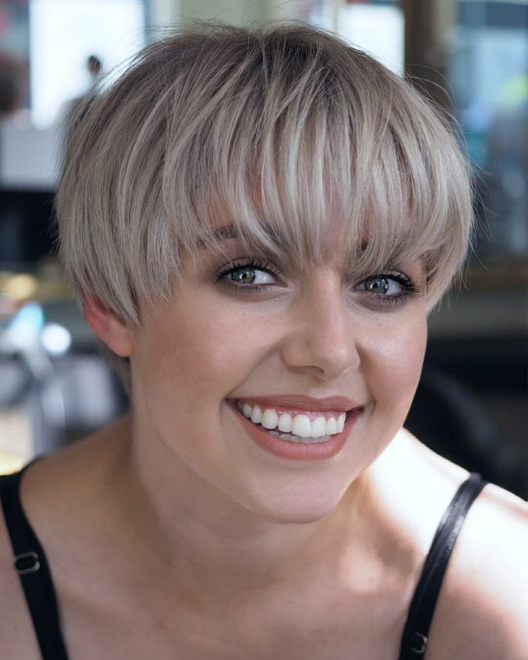 Layered Blonde Bowl Cut for Round Faces